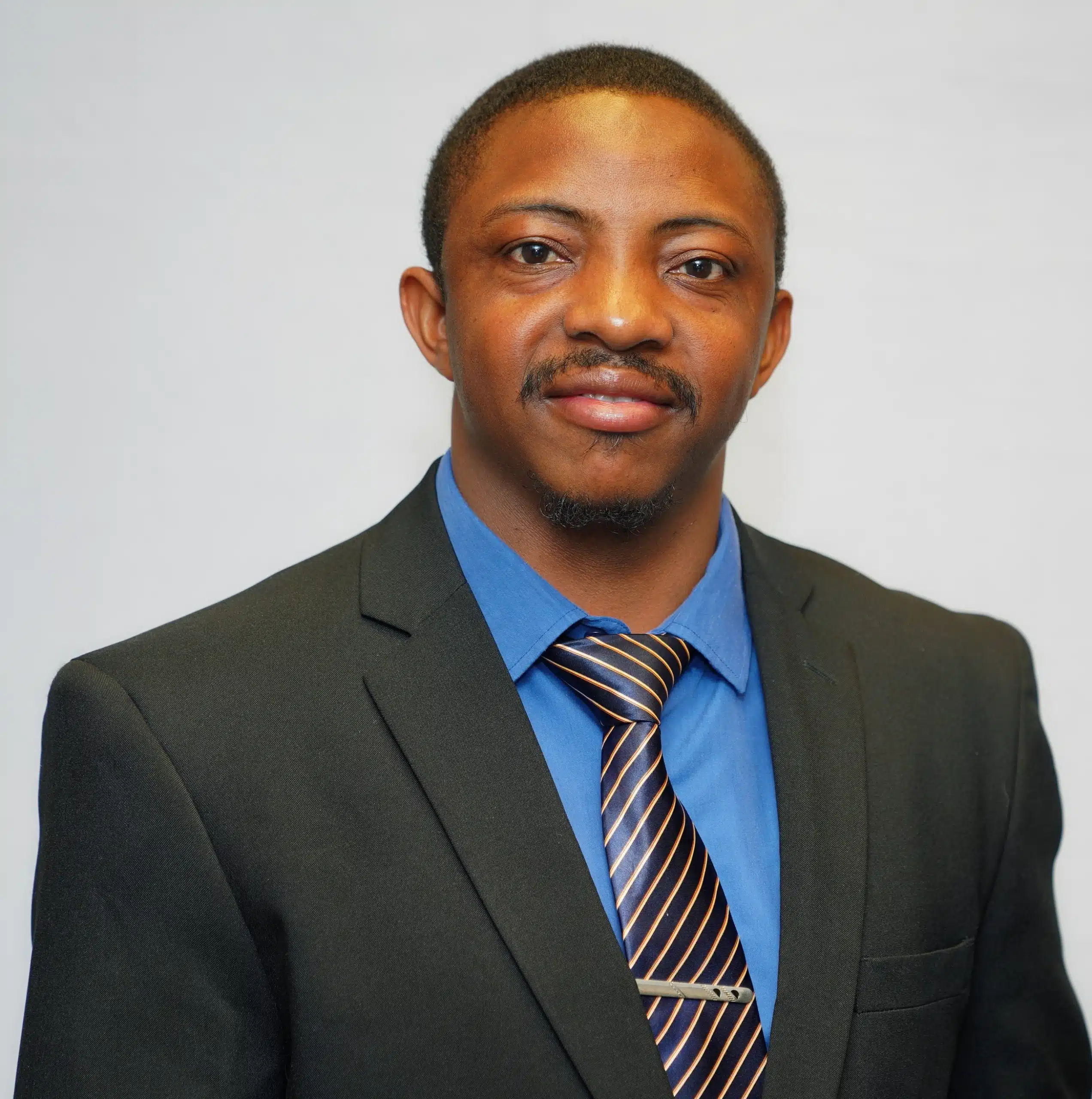 Headshot of Joel O. Alabi